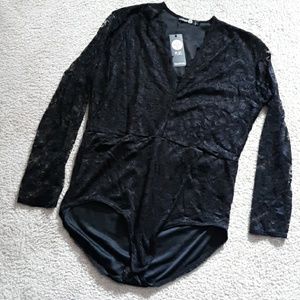 Lacy long sleeved Bodysuit NWT